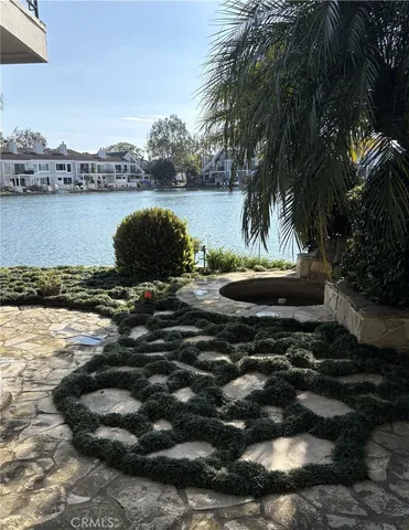 a view of a lake from a yard