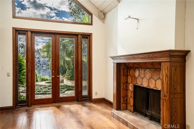 a view of an entryway with wooden floor