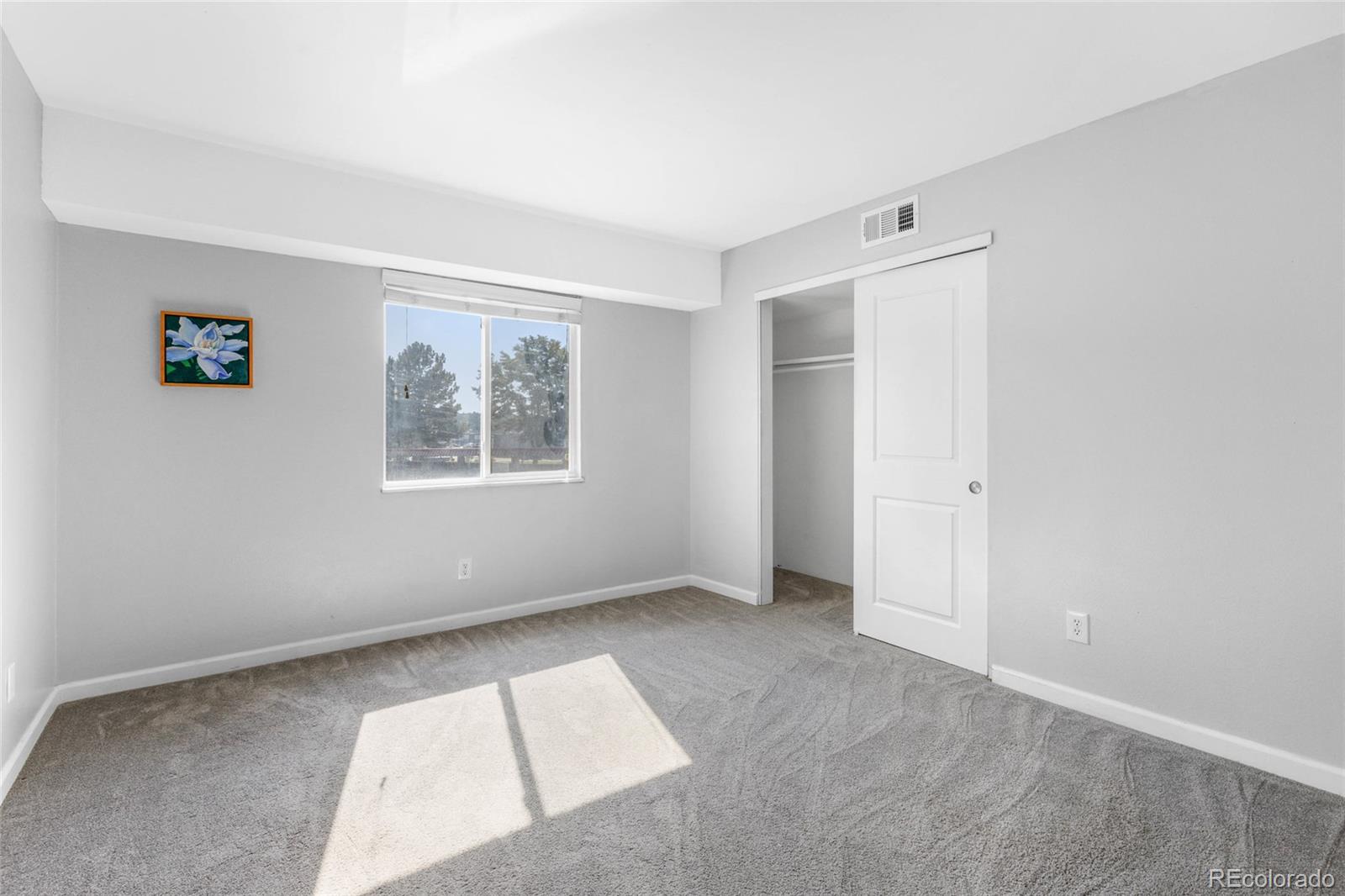 7755 East Quincy Avenue, Unit 205A5 Denver, CO 80237 - Photo 13 of 23 an empty room with windows