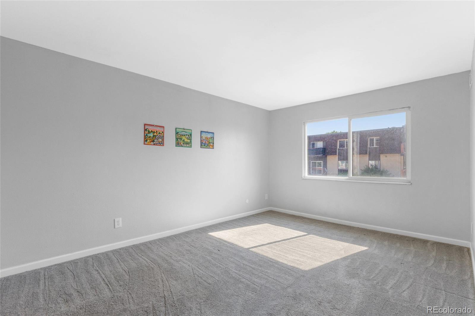 7755 East Quincy Avenue, Unit 205A5 Denver, CO 80237 - Photo 18 of 23 an empty room with a window