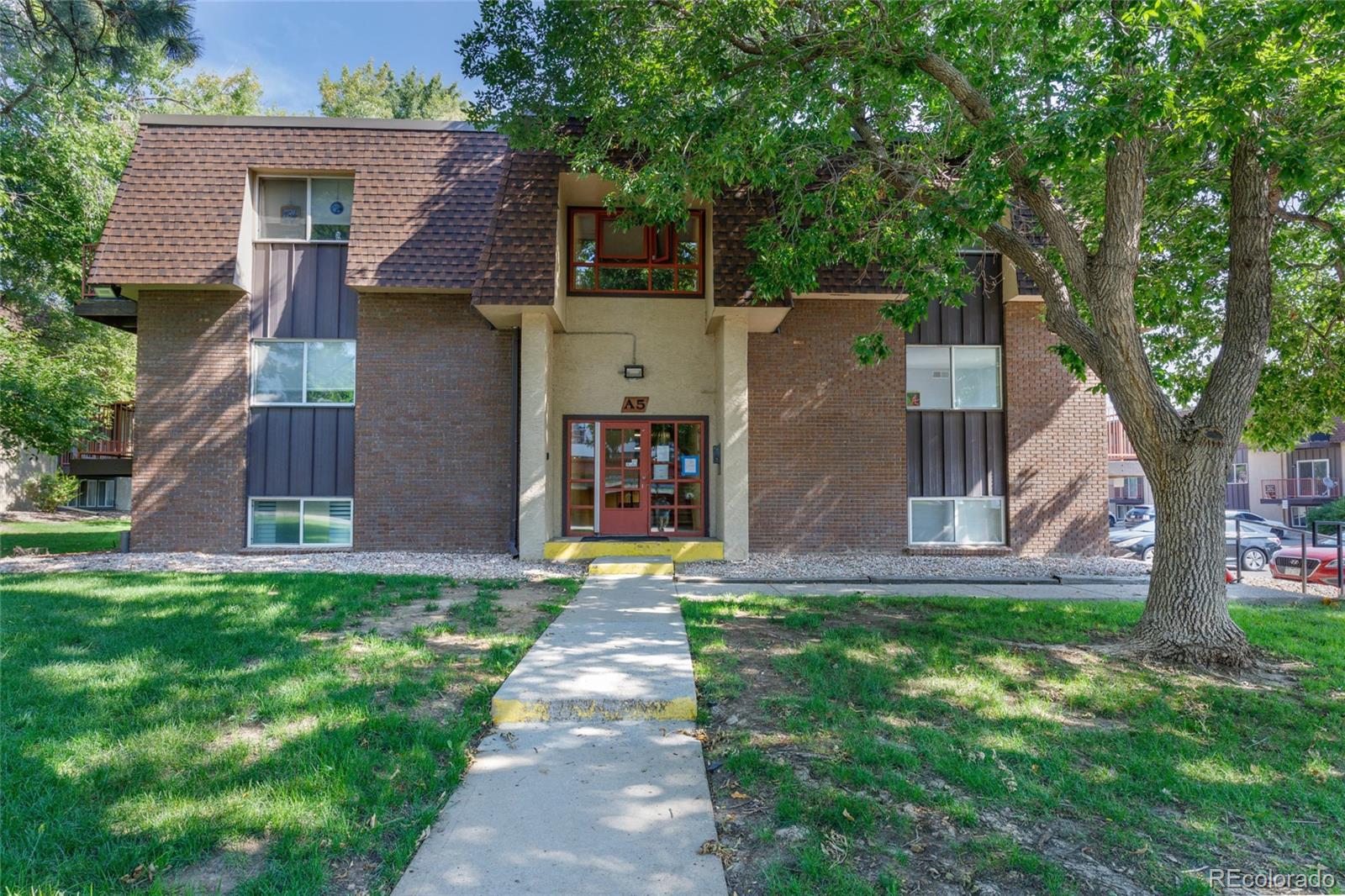 7755 East Quincy Avenue, Unit 205A5 Denver, CO 80237 - Photo 19 of 23 a view of a back yard of the house