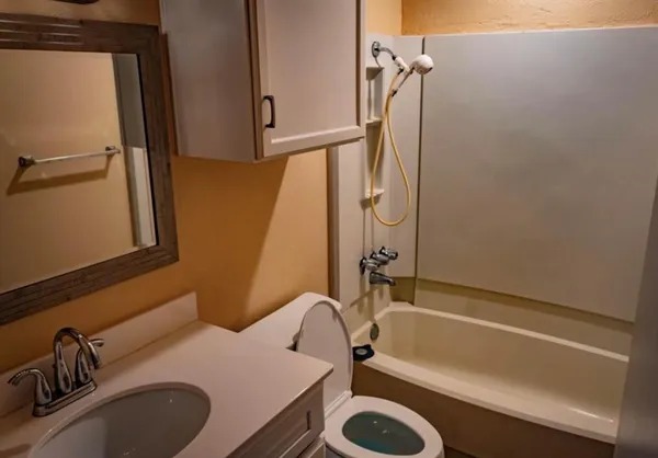 a bathroom with a sink and a tub