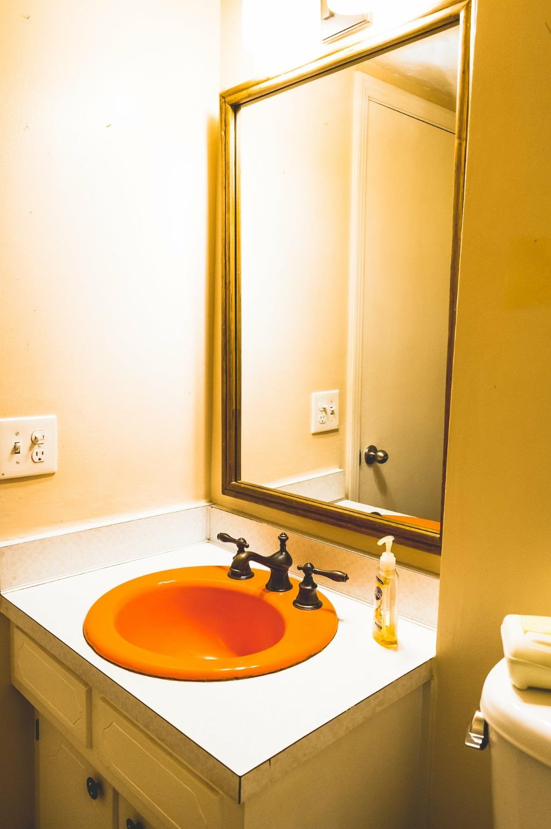 4000 Anderson Road, Unit 43 Nashville, TN 37217 - Photo 6 of 21 a bathroom with a sink and a blue sink
