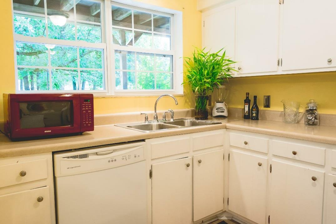 4000 Anderson Road, Unit 43 Nashville, TN 37217 - Photo 8 of 21 a kitchen with white cabinets and a window