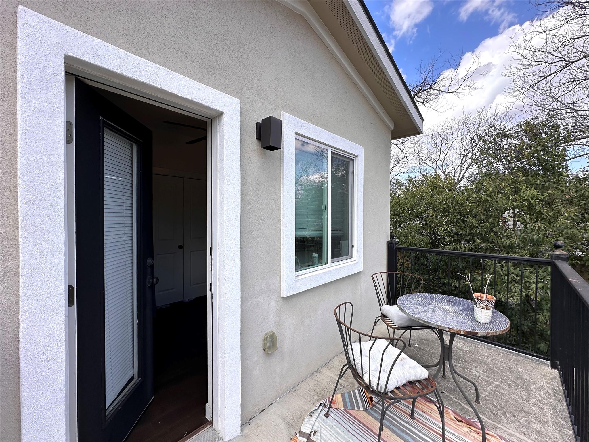 5004 Rowena Avenue, Unit A Austin, TX 78751 - Photo 20 of 24 a view of a chair and table in the balcony