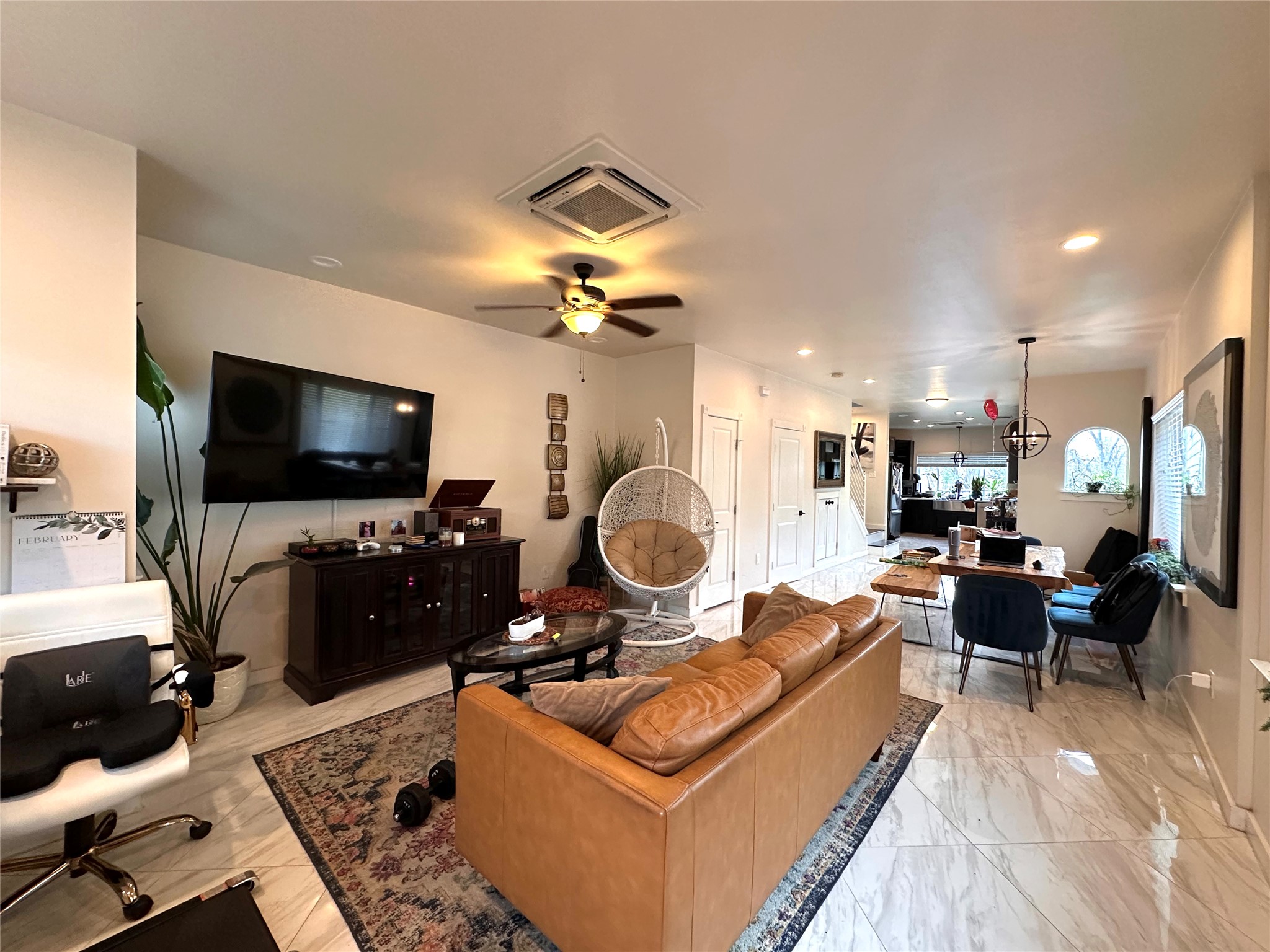 5004 Rowena Avenue, Unit A Austin, TX 78751 - Photo 5 of 24 a living room with furniture and a flat screen tv