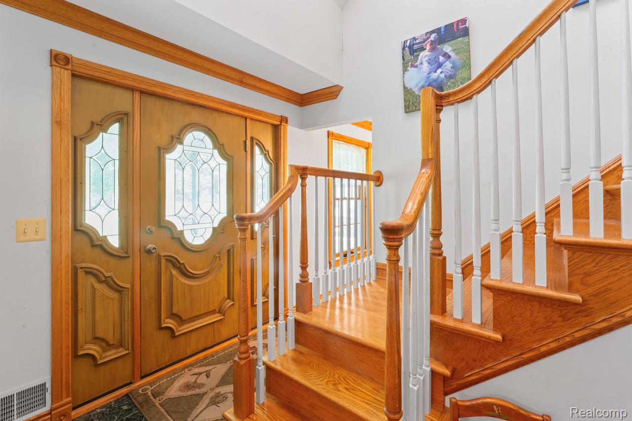 1591 Baldwin Road Lapeer, MI 48446 - Photo 2 of 46 Foyer entrance with stairway