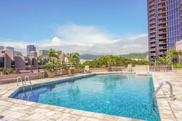 a view of a swimming pool and outdoor space