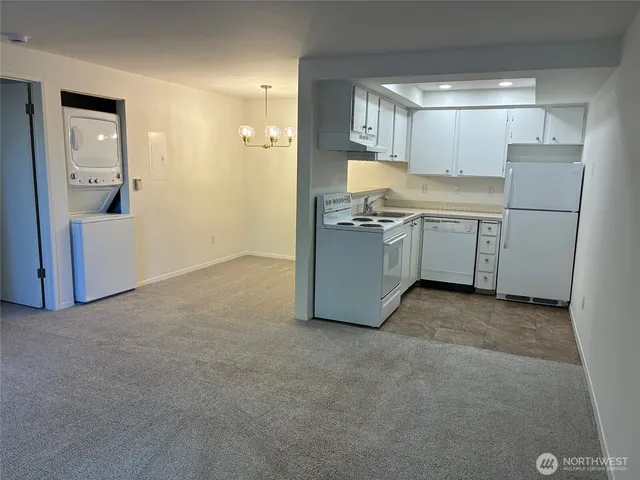 a view of a kitchen with a sink