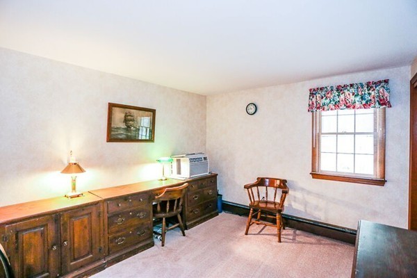 67 Bare Hill Road Topsfield, MA 01983 - Photo 11 of 22 a view of a workspace with furniture and a window