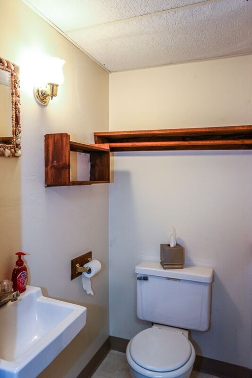 67 Bare Hill Road Topsfield, MA 01983 - Photo 18 of 22 a bathroom with a toilet and a sink