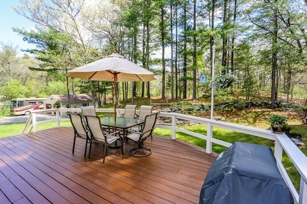 67 Bare Hill Road Topsfield, MA 01983 - Photo 19 of 22 a view of a chairs and table on the wooden floor