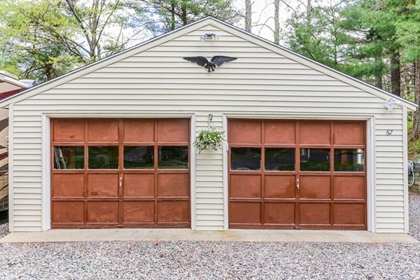 67 Bare Hill Road Topsfield, MA 01983 - Photo 21 of 22 a front view of a house with a yard