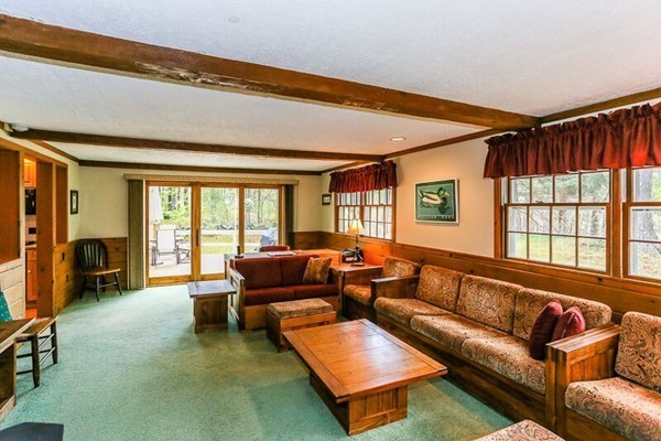 67 Bare Hill Road Topsfield, MA 01983 - Photo 7 of 22 a living room with furniture and a large window