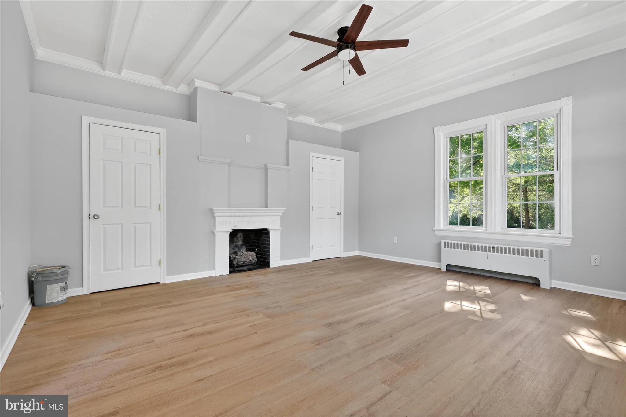 509 Lumberton Road, Unit 1 Hainesport, NJ 08036 - Photo 9 of 33 a view of empty room with window and fireplace