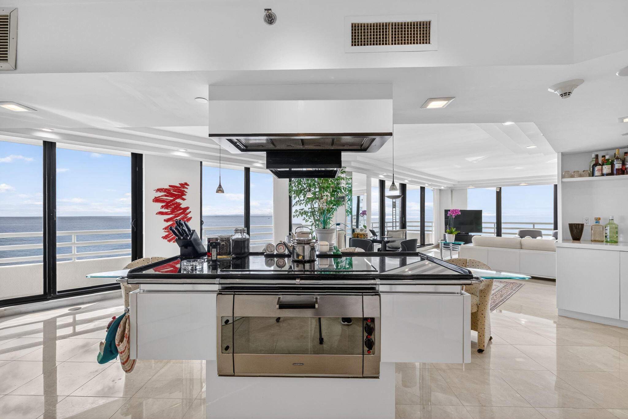 1500 South Ocean Boulevard, Unit 606 Boca Raton, FL 33432 - Photo 13 of 77 a kitchen with a sink and cabinets