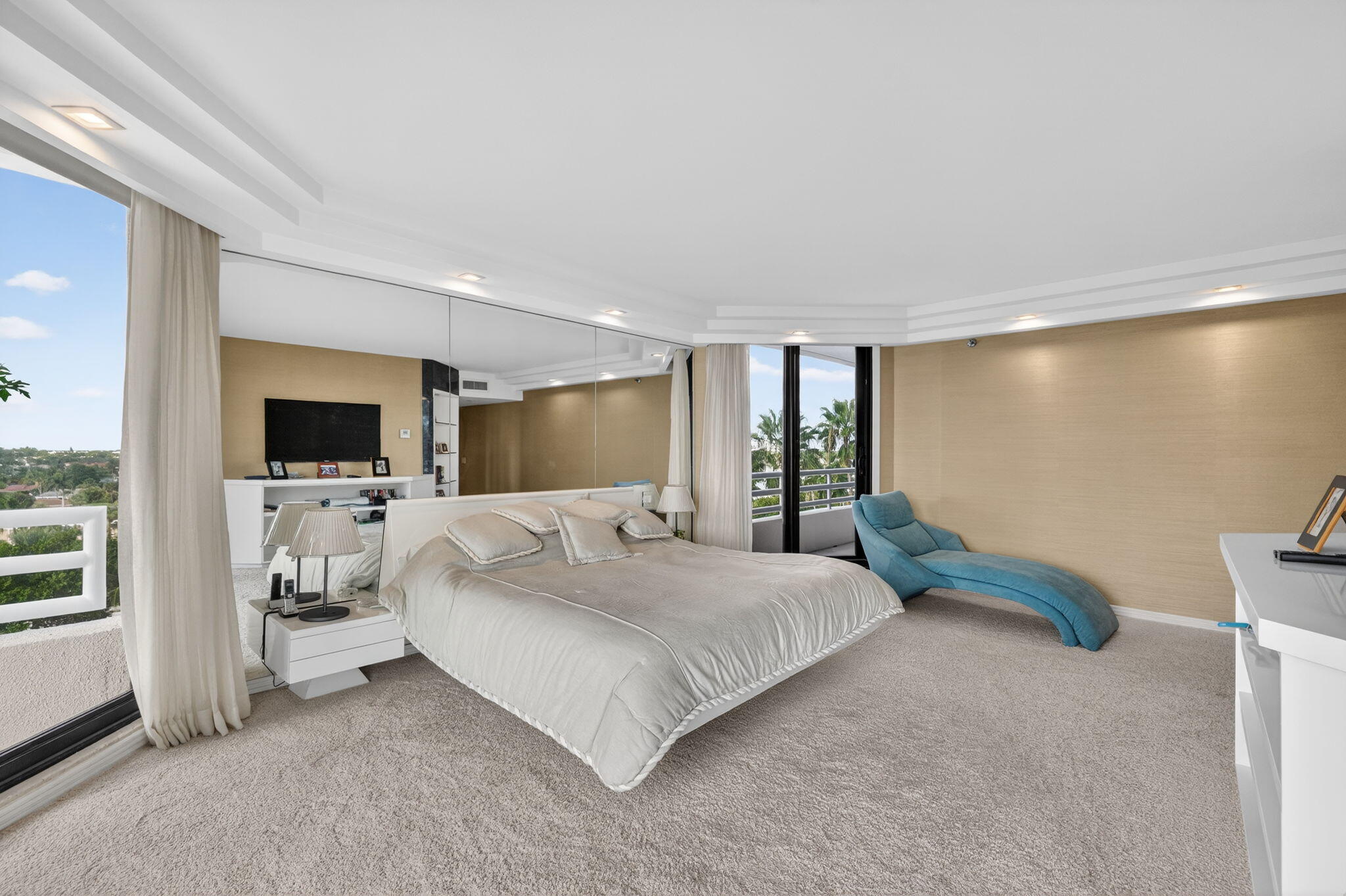 1500 South Ocean Boulevard, Unit 606 Boca Raton, FL 33432 - Photo 14 of 77 a bedroom with a bed and a flat screen tv