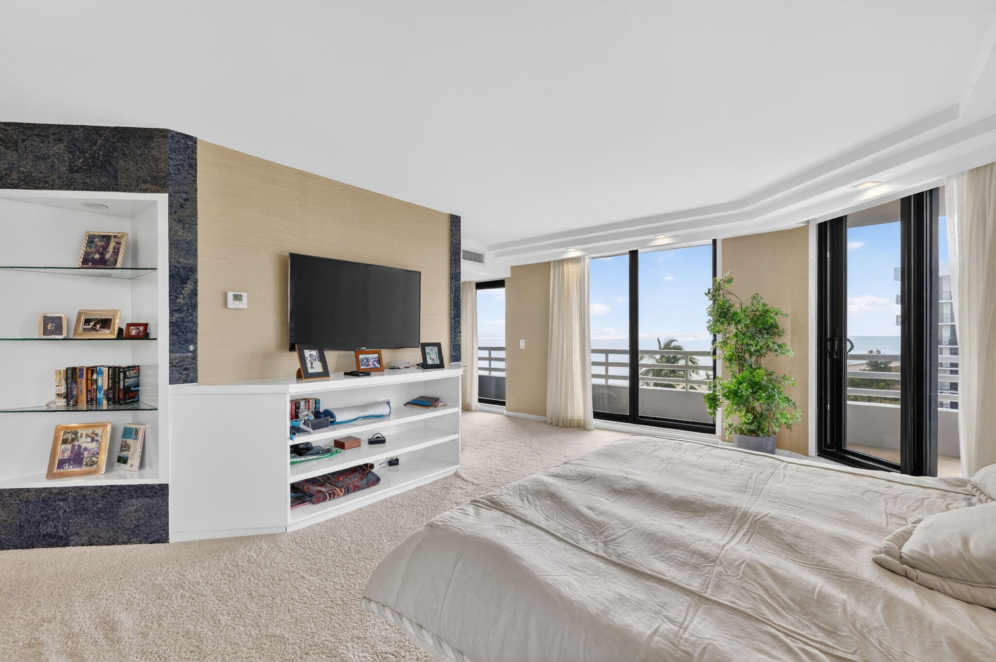 1500 South Ocean Boulevard, Unit 606 Boca Raton, FL 33432 - Photo 15 of 77 a view of a bedroom with furniture and window