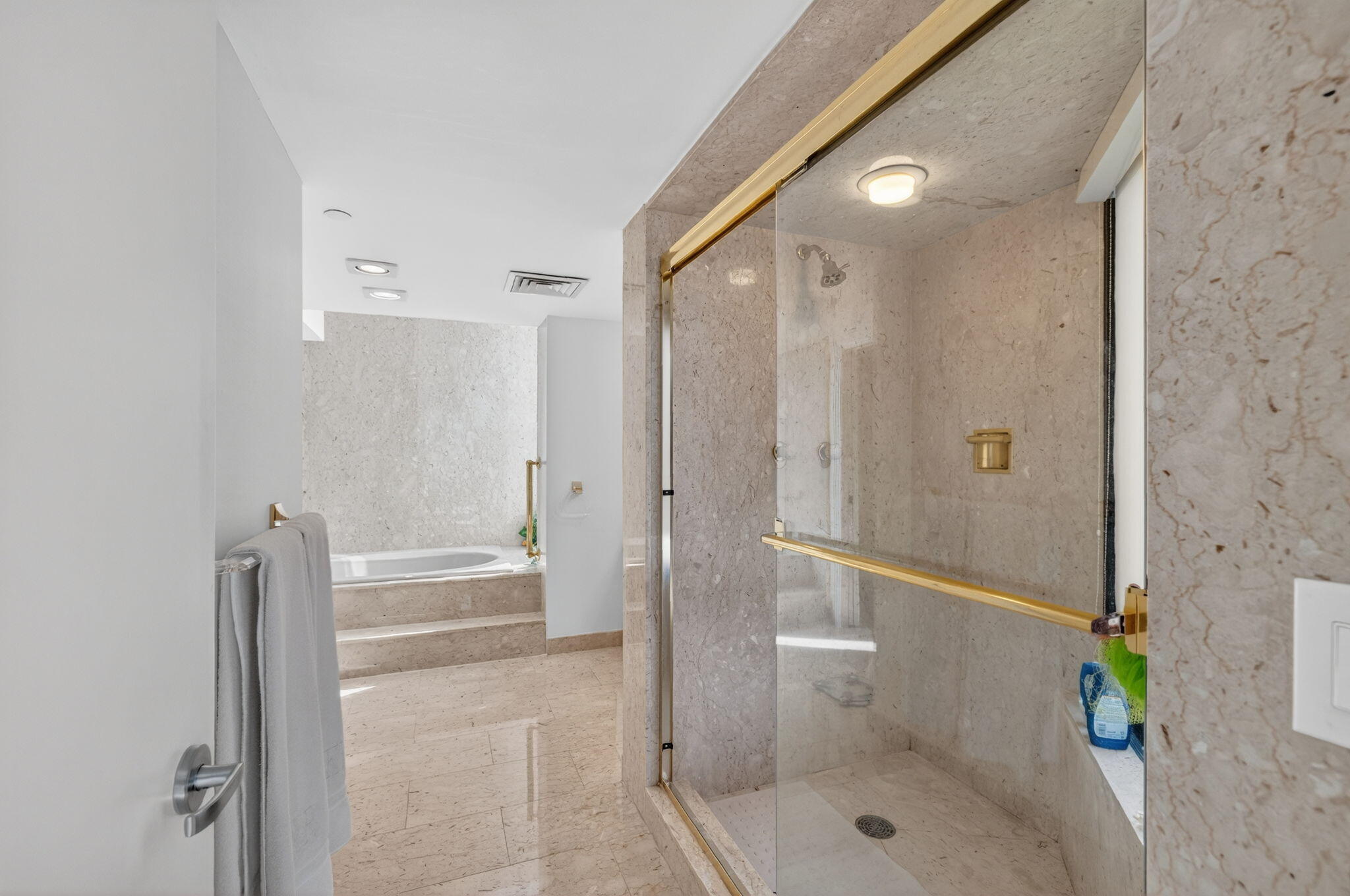 1500 South Ocean Boulevard, Unit 606 Boca Raton, FL 33432 - Photo 21 of 77 a bathroom with a shower and a toilet