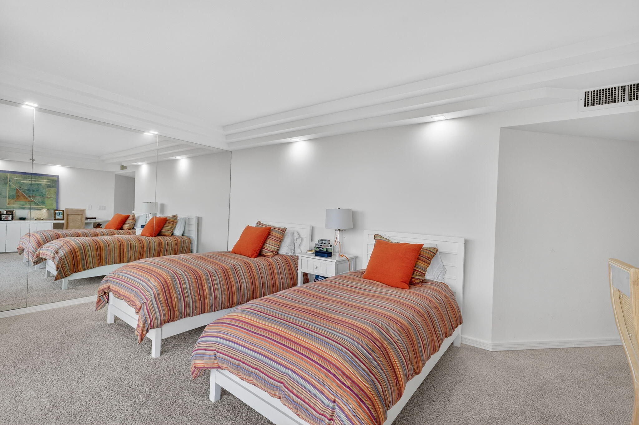 1500 South Ocean Boulevard, Unit 606 Boca Raton, FL 33432 - Photo 26 of 77 a bedroom with two beds and a night stand