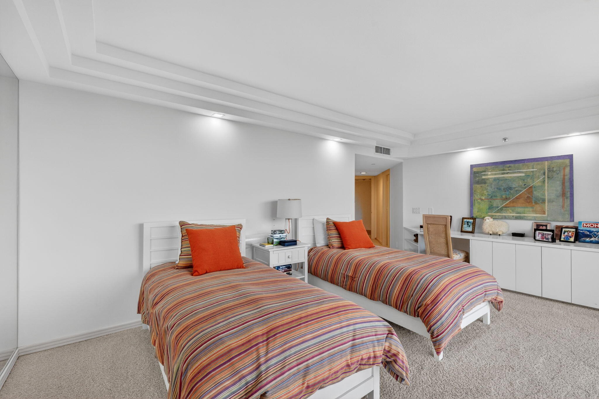 1500 South Ocean Boulevard, Unit 606 Boca Raton, FL 33432 - Photo 27 of 77 a bedroom with two beds and a flat screen tv