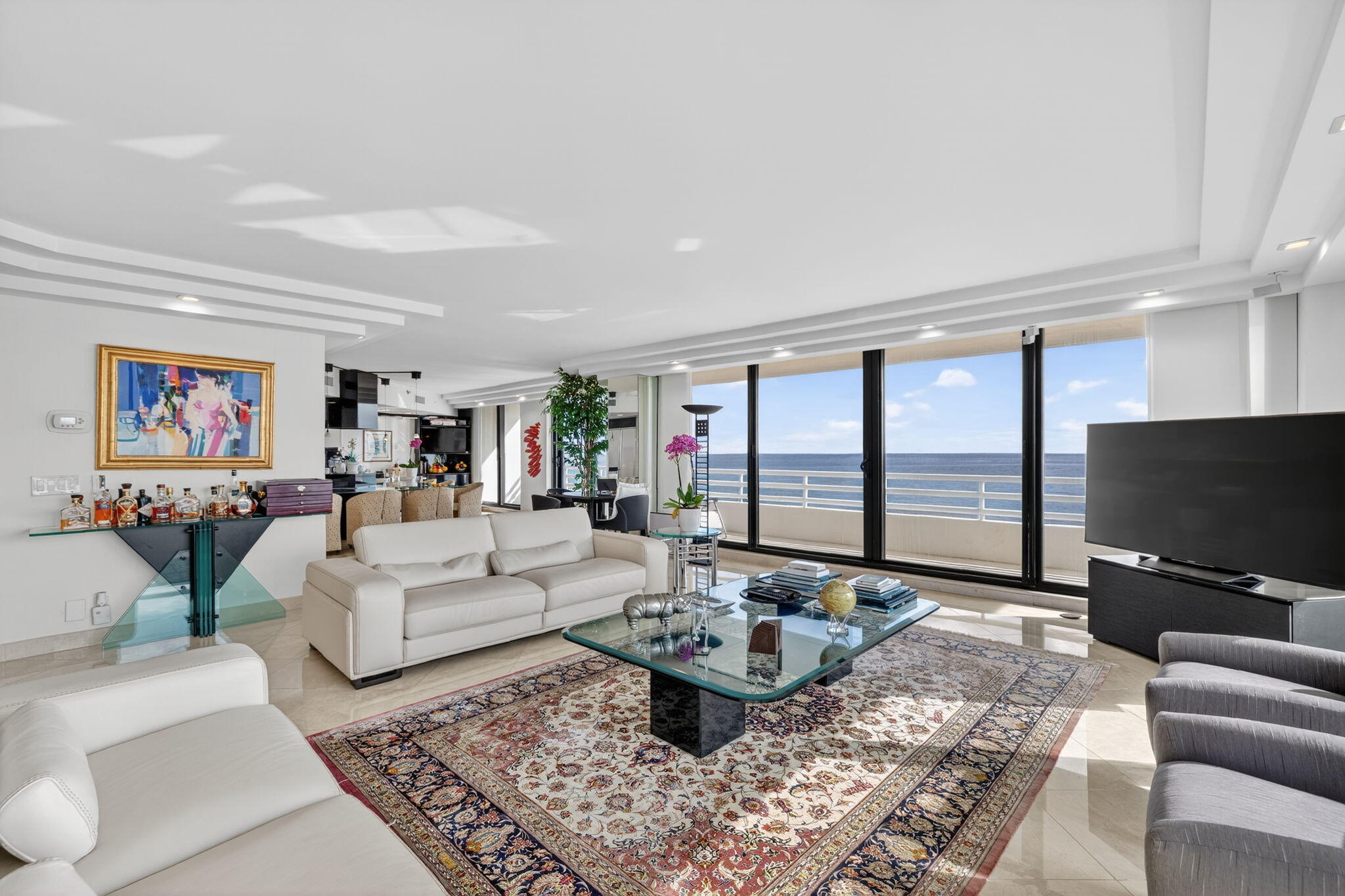 1500 South Ocean Boulevard, Unit 606 Boca Raton, FL 33432 - Photo 3 of 77 a living room with fireplace furniture and a flat screen tv