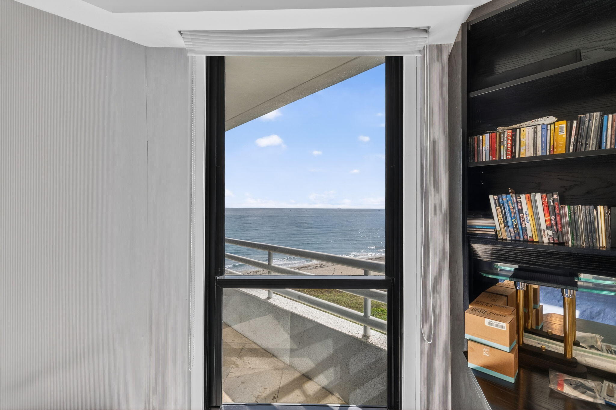 1500 South Ocean Boulevard, Unit 606 Boca Raton, FL 33432 - Photo 31 of 77 a view of a balcony and a floor to ceiling window