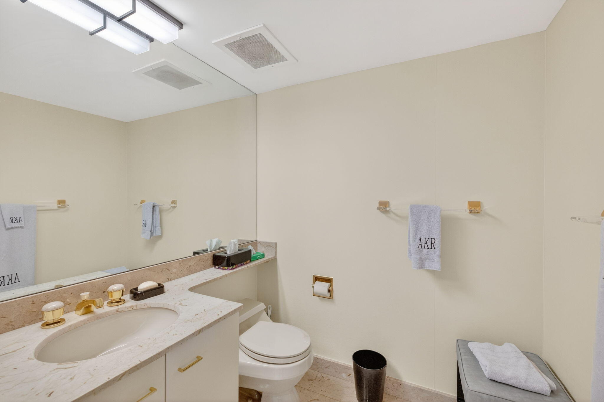 1500 South Ocean Boulevard, Unit 606 Boca Raton, FL 33432 - Photo 33 of 77 a bathroom with a granite countertop sink a toilet and a mirror