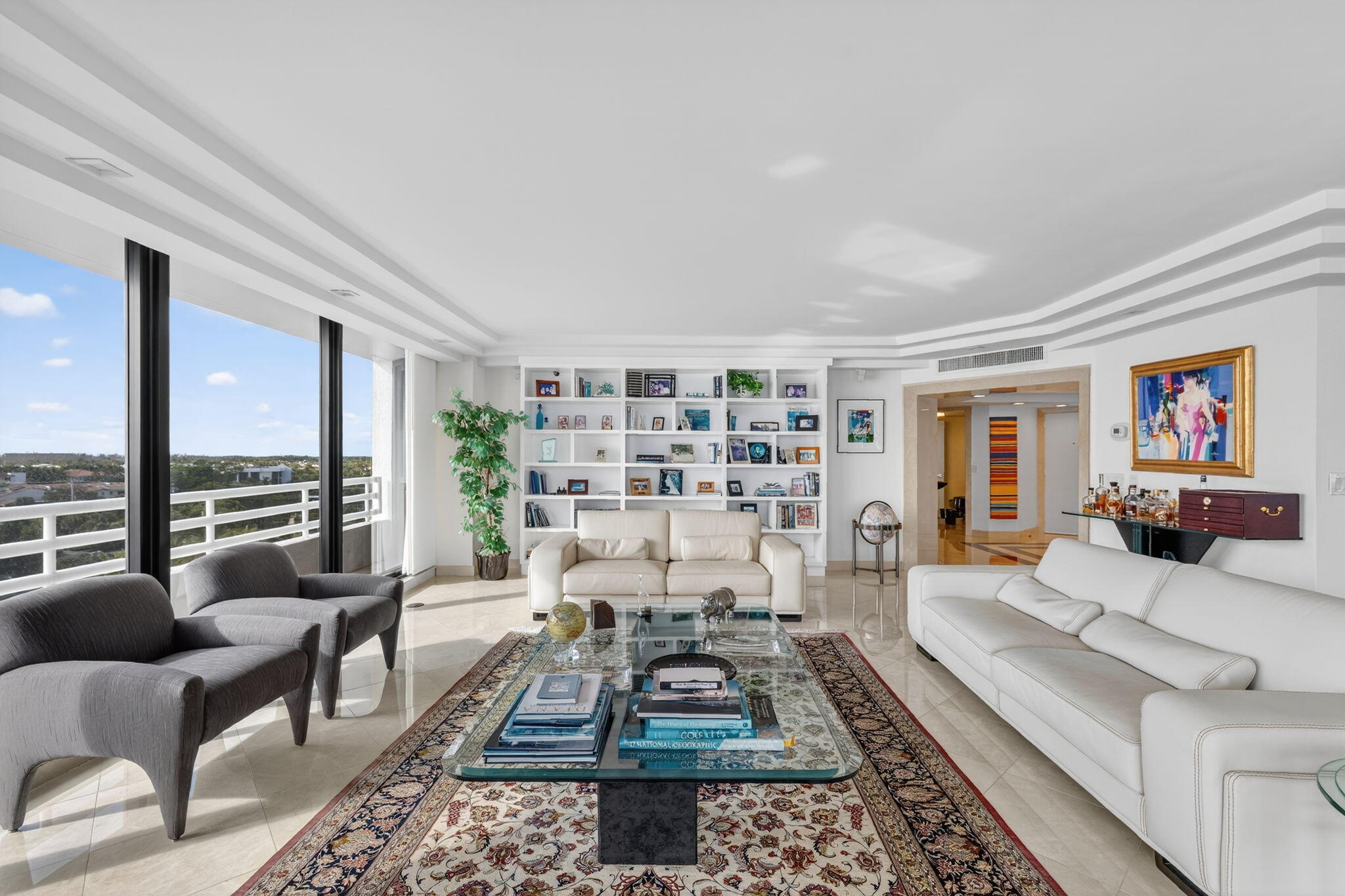 1500 South Ocean Boulevard, Unit 606 Boca Raton, FL 33432 - Photo 7 of 77 a living room with furniture and a rug