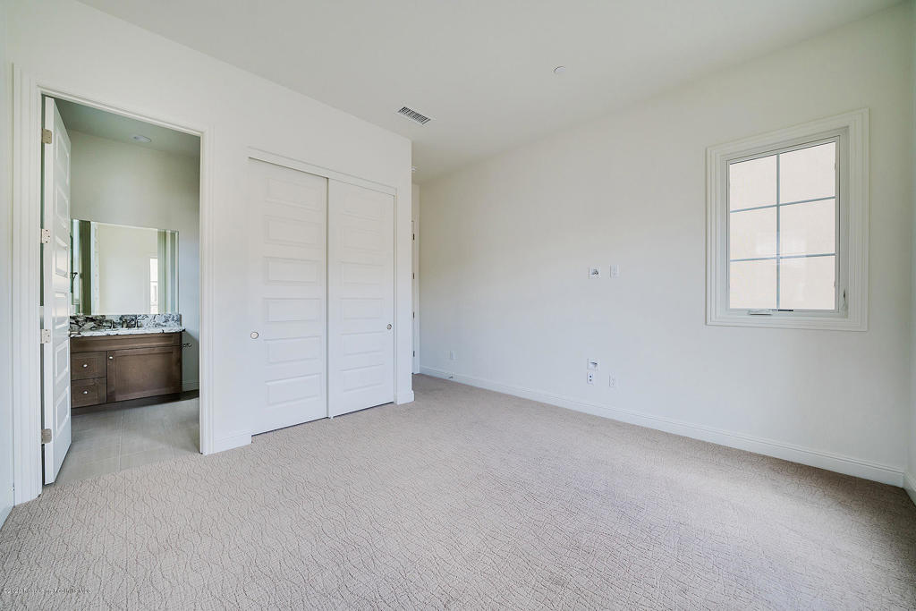 20156 West Cromwell Way Porter Ranch, CA 91326 - Photo 13 of 39 an empty room with a window and a kitchen view