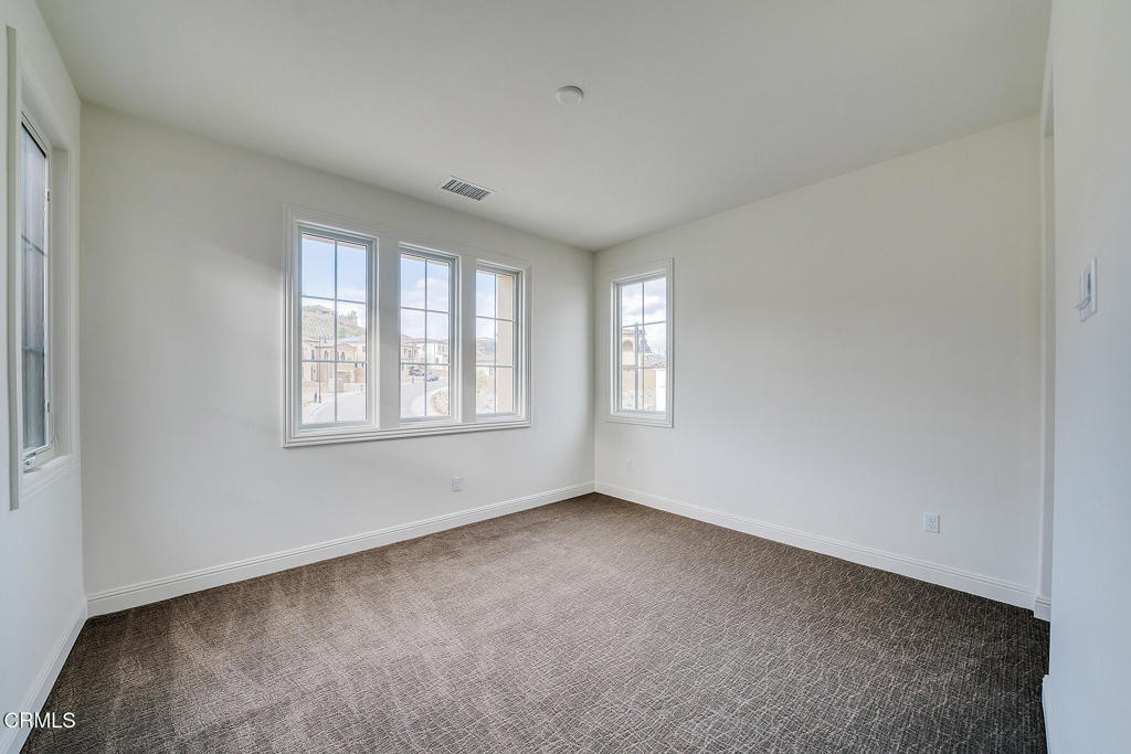 20156 West Cromwell Way Porter Ranch, CA 91326 - Photo 26 of 39 an empty room with windows