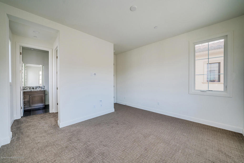 20156 West Cromwell Way Porter Ranch, CA 91326 - Photo 27 of 39 an empty room with windows and closet