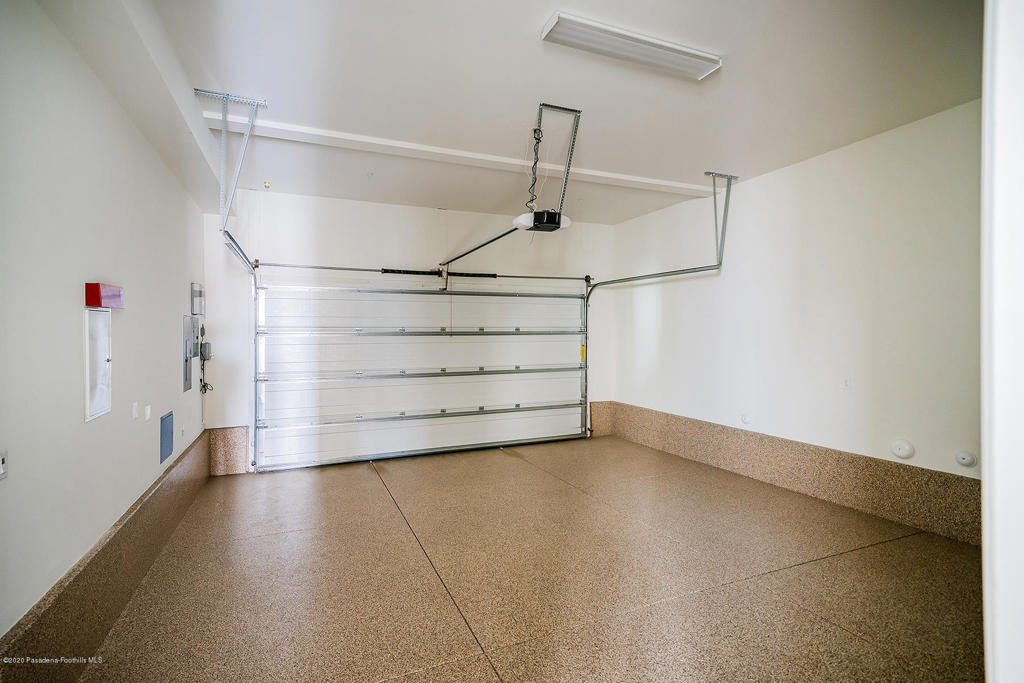20156 West Cromwell Way Porter Ranch, CA 91326 - Photo 33 of 39 a view of a room with racks on the wall