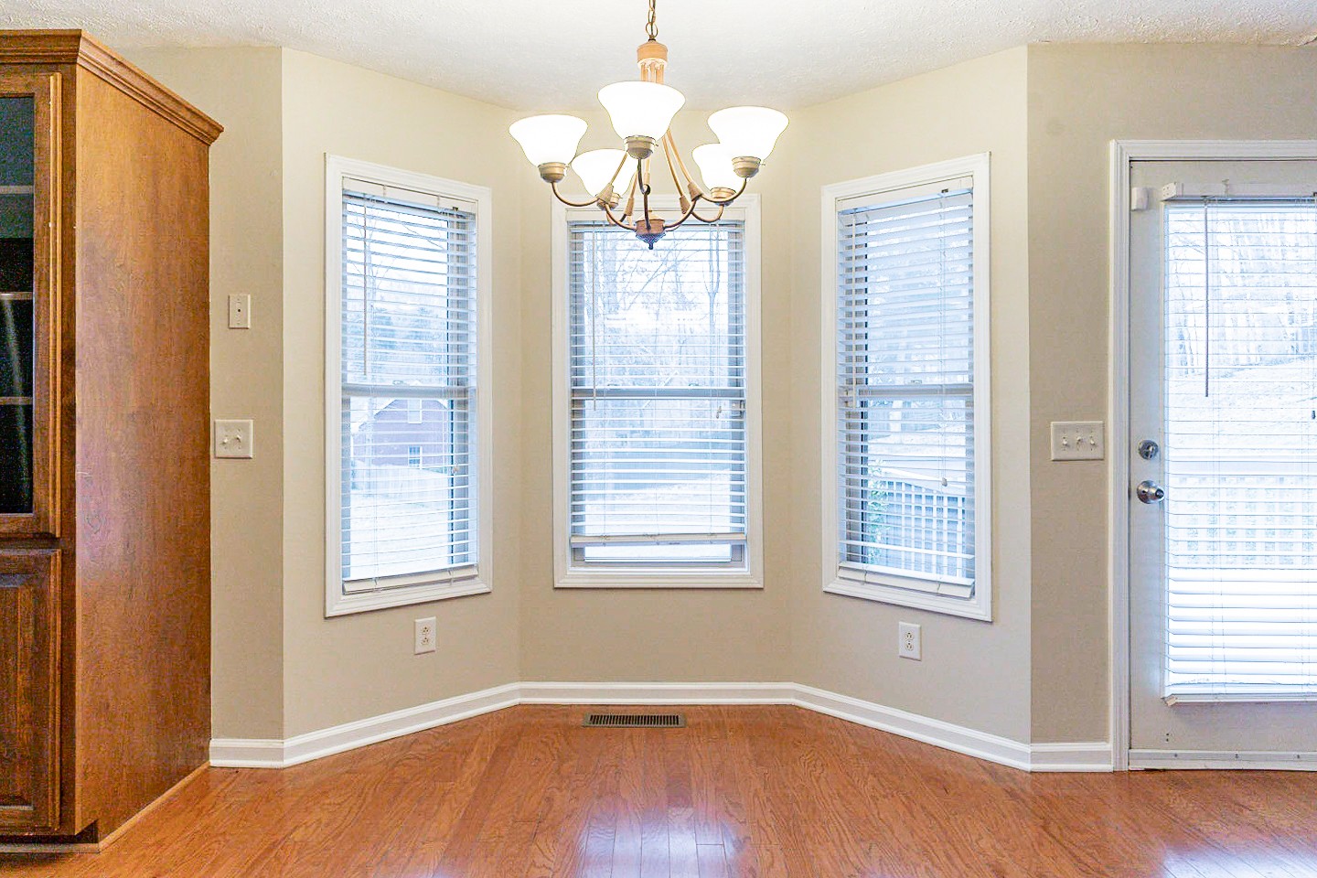 105 High Ridge Court Goodlettsville, TN 37072 - Photo 13 of 31 a view of an empty room with wooden floor and a window