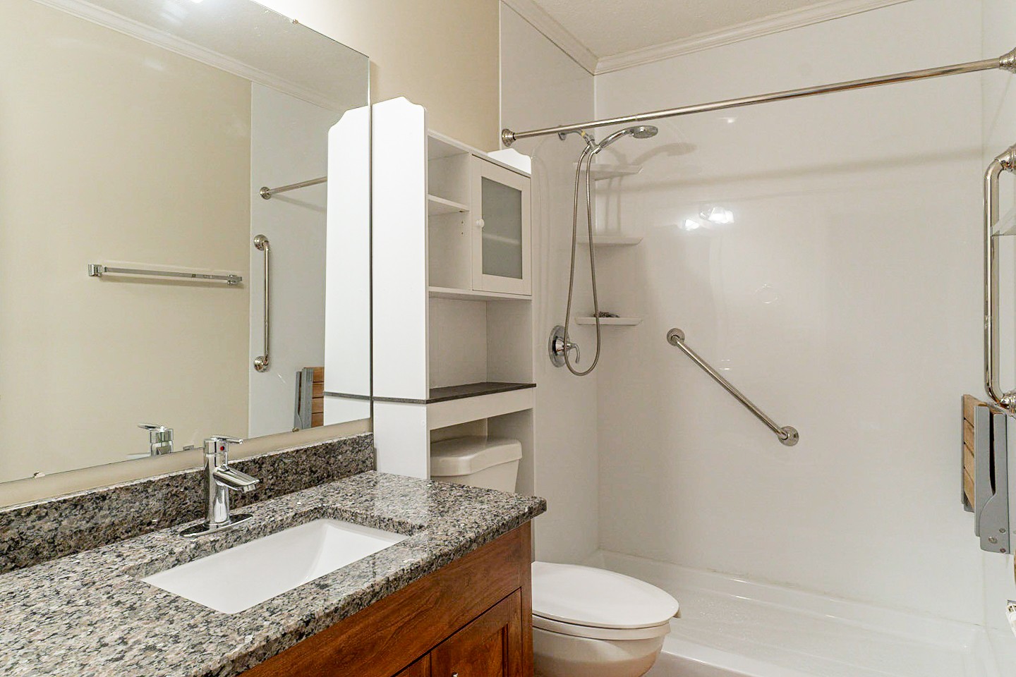 105 High Ridge Court Goodlettsville, TN 37072 - Photo 25 of 31 a bathroom with a granite countertop shower sink vanity mirror and toilet