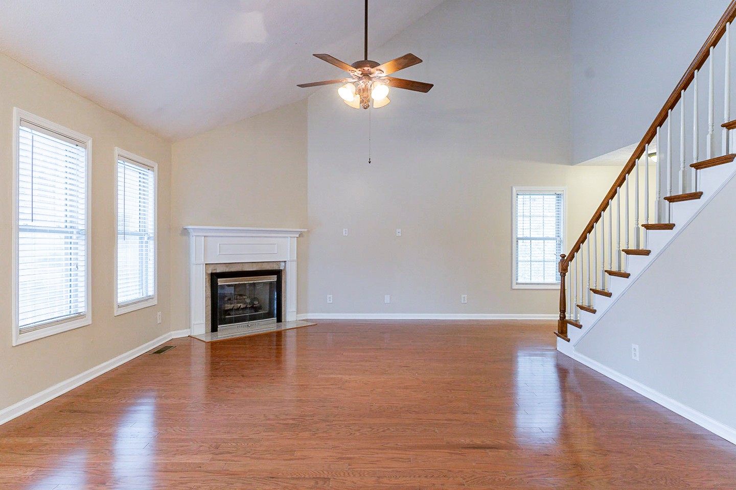 105 High Ridge Court Goodlettsville, TN 37072 - Photo 5 of 31 a view of an empty room with wooden floor fireplace and a window