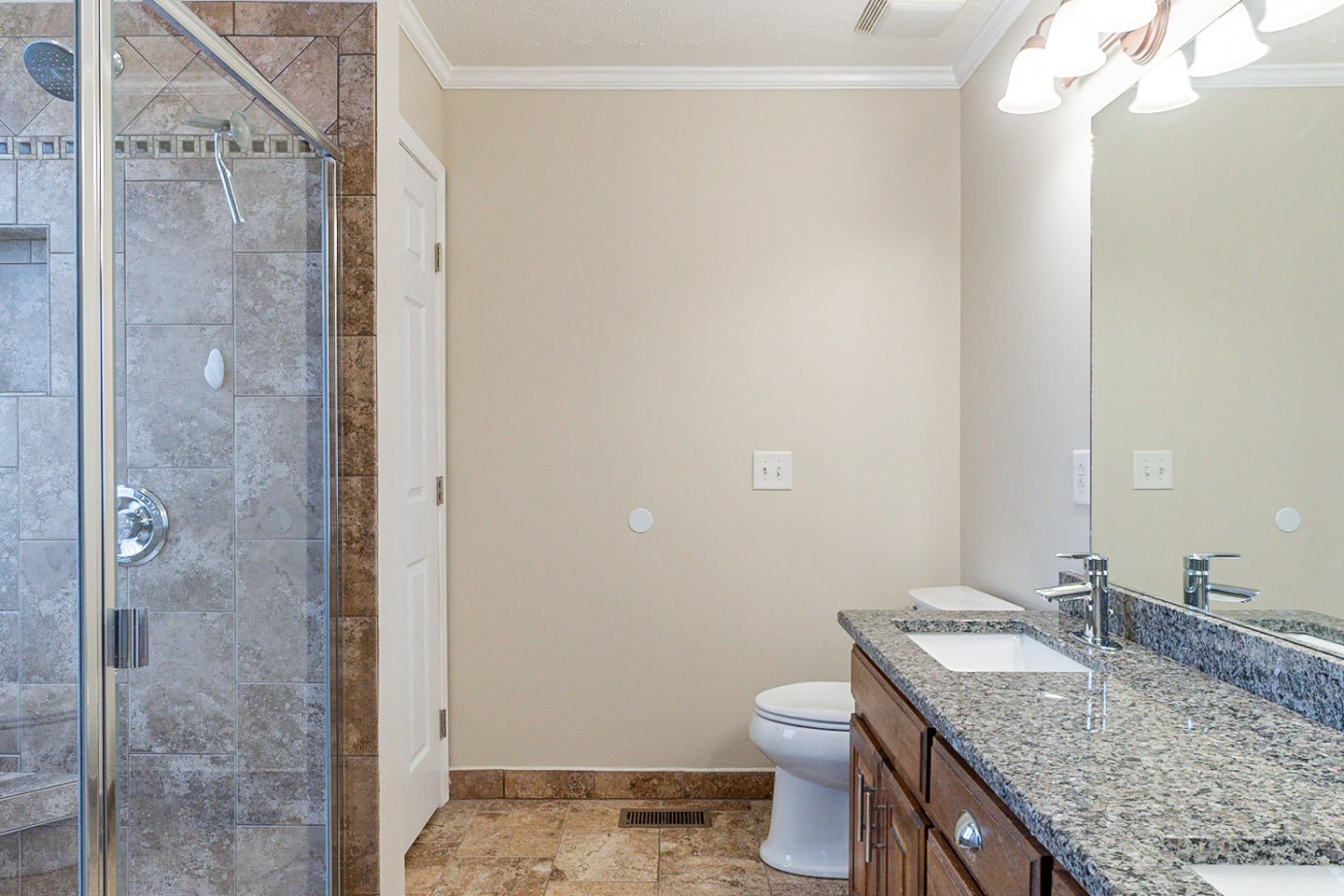 105 High Ridge Court Goodlettsville, TN 37072 - Photo 6 of 31 a bathroom with a granite countertop sink a toilet and shower