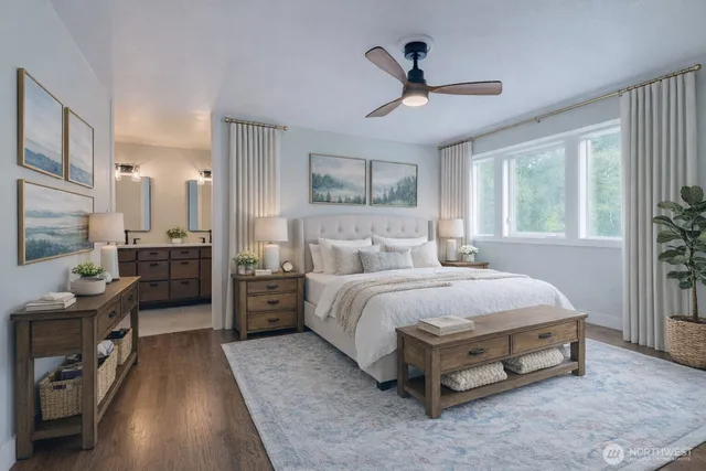 a spacious bedroom with a bed and a chandelier