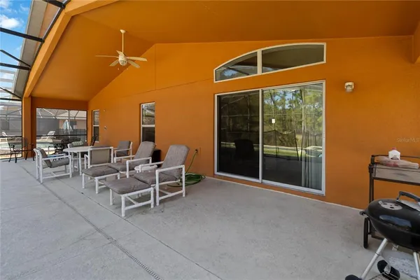 a view of a chairs and table in a room