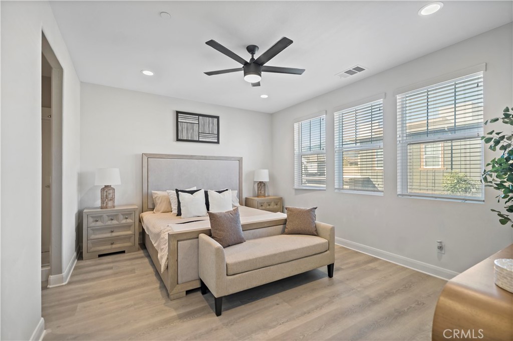 7459 Solstice Place Rancho Cucamonga, CA 91739 - Photo 27 of 57 a living room with furniture and a window