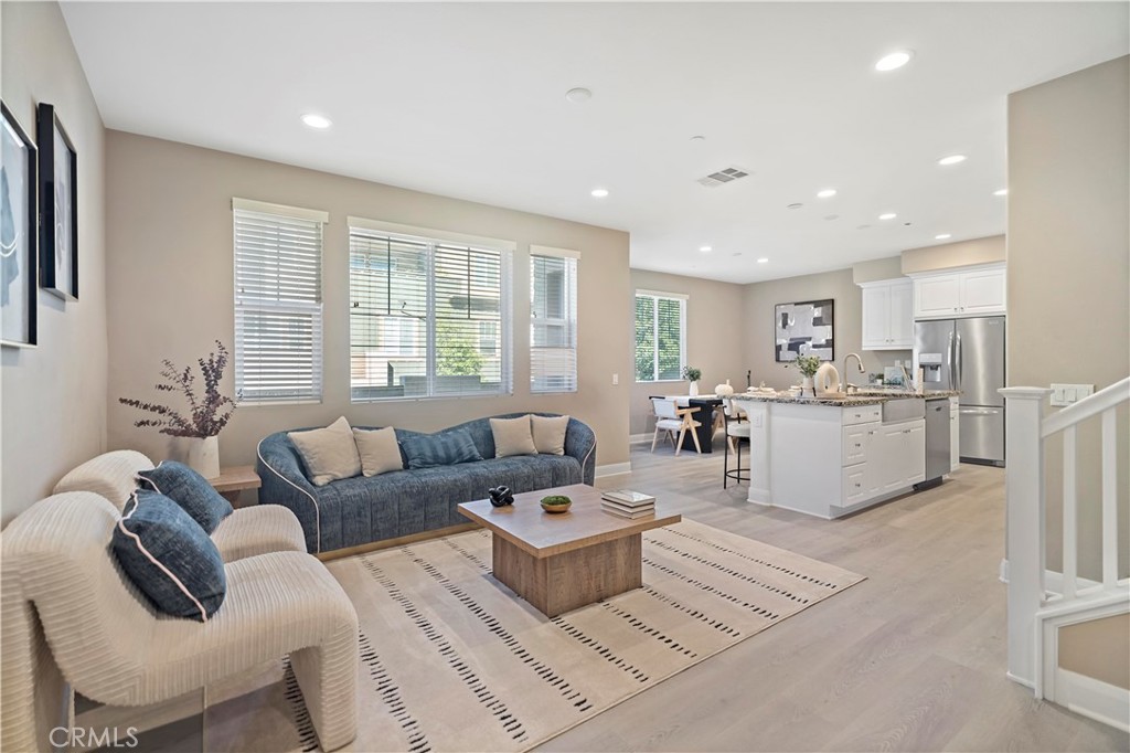 7459 Solstice Place Rancho Cucamonga, CA 91739 - Photo 3 of 57 a living room with furniture and a large window