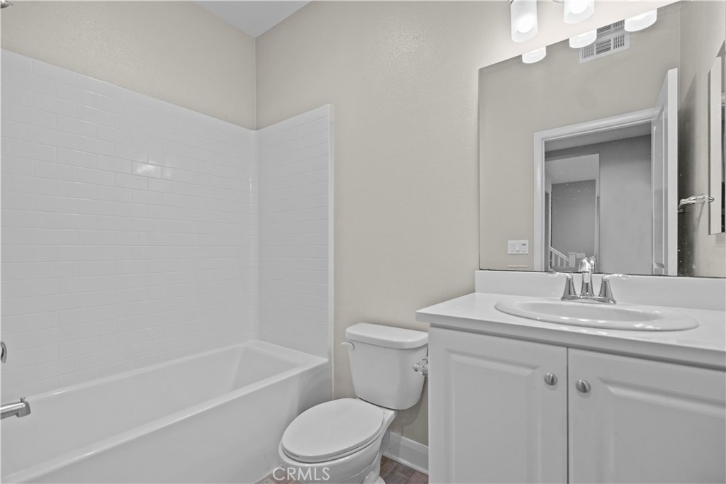 7459 Solstice Place Rancho Cucamonga, CA 91739 - Photo 42 of 57 a bathroom with a sink a toilet and shower