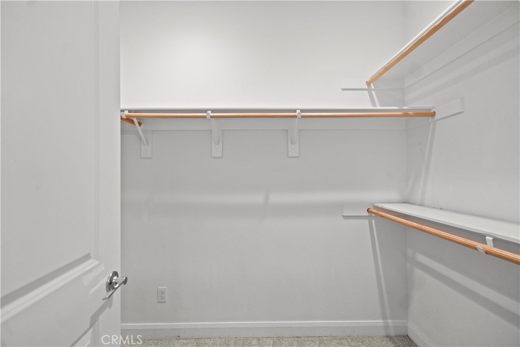 7459 Solstice Place Rancho Cucamonga, CA 91739 - Photo 51 of 57 a view of a room with racks on the wall