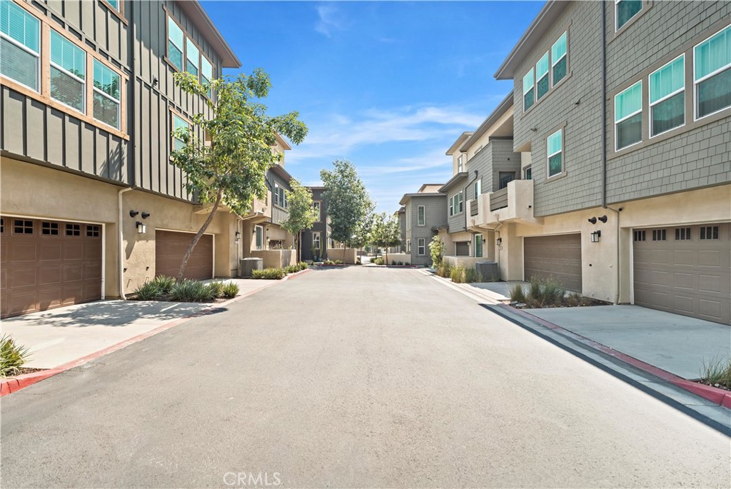 7459 Solstice Place Rancho Cucamonga, CA 91739 - Photo 55 of 57 a view of a building with a street