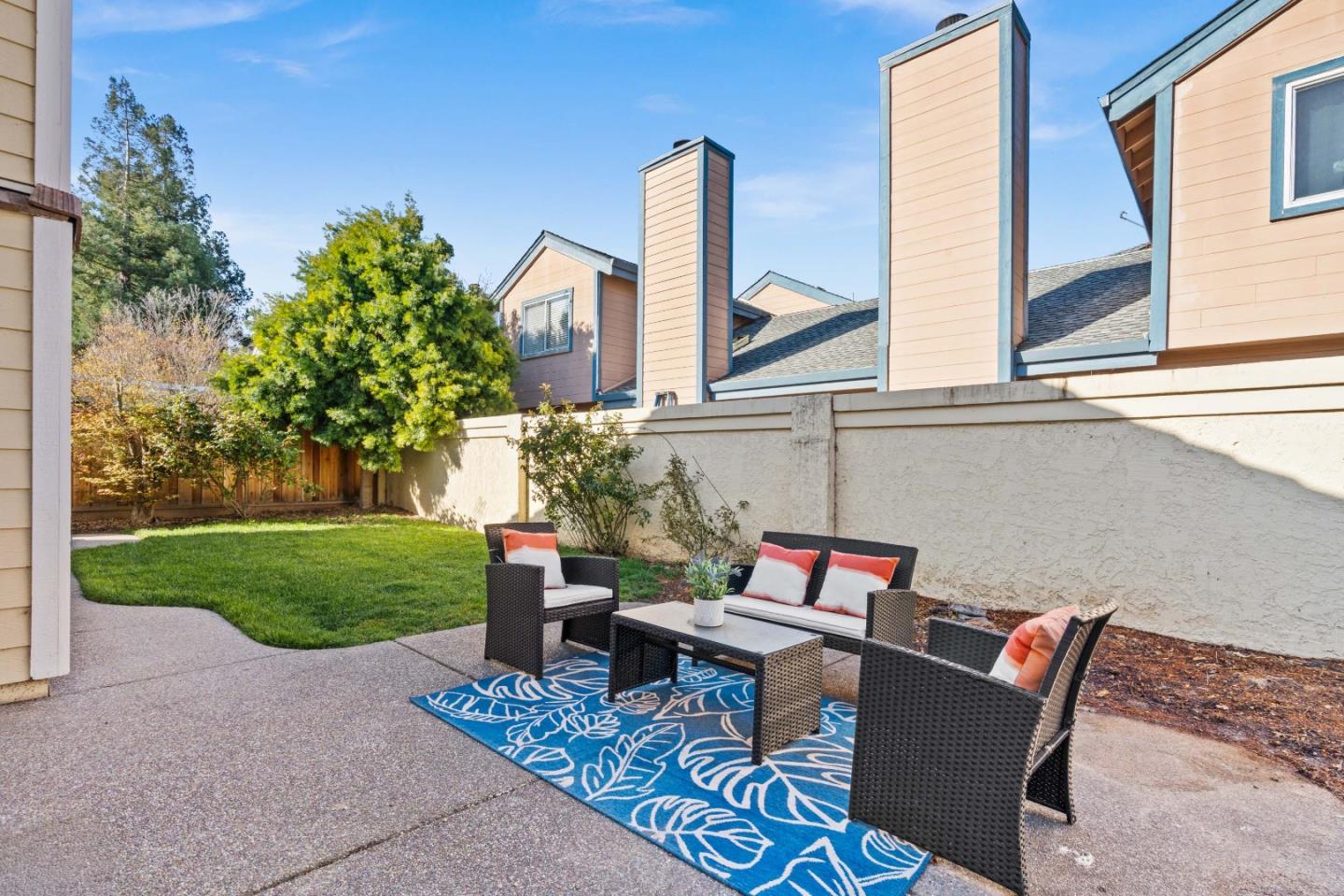 258 Trenton Circle Pleasanton, CA 94566 - Photo 10 of 10 a backyard of a house with table and chairs