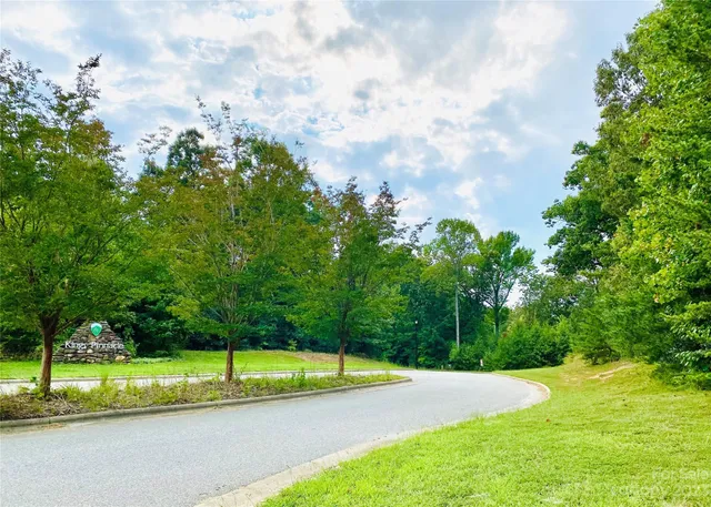 a view of a playground and basketball court