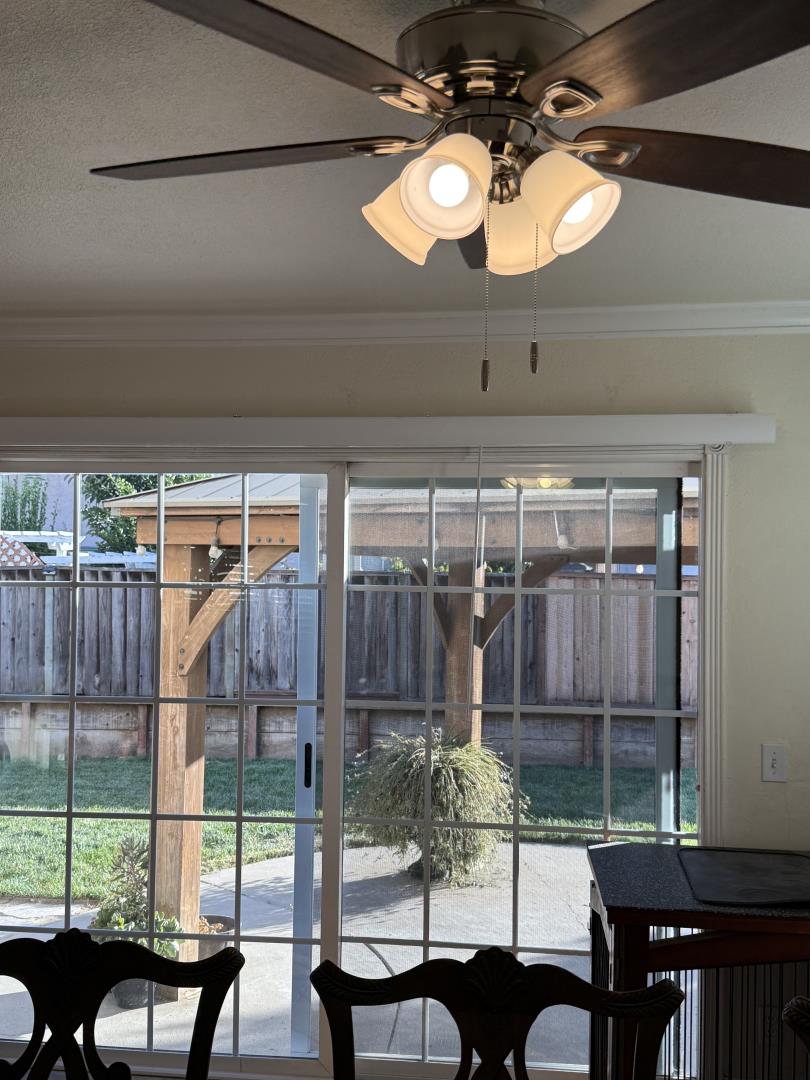 5736 Silver Leaf Road San Jose, CA 95138 - Photo 22 of 42 a view of a room that has a table and chairs