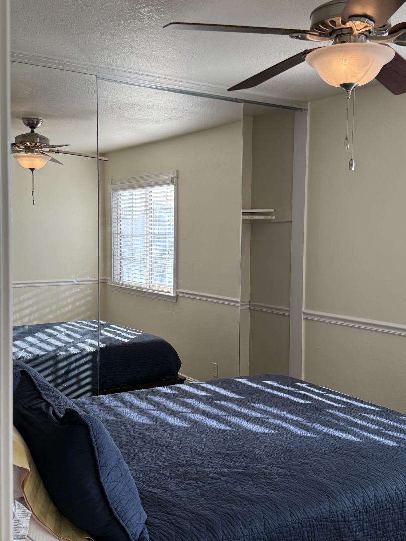 5736 Silver Leaf Road San Jose, CA 95138 - Photo 33 of 42 a bedroom with a bed and a window
