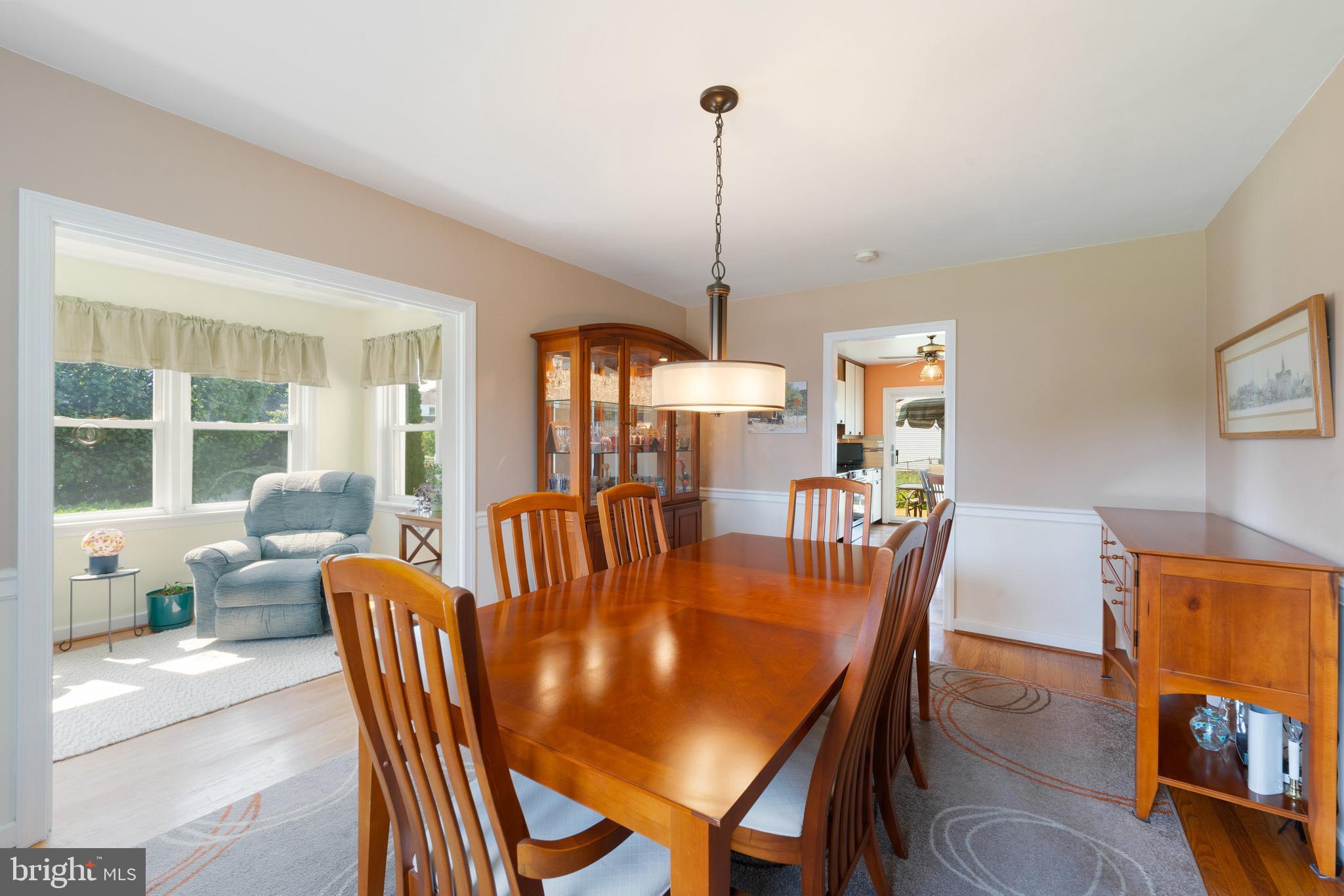 410 Crum Lynne Road Ridley Park, PA 19078 - Photo 13 of 43 a view of a dining room with furniture window and wooden floor