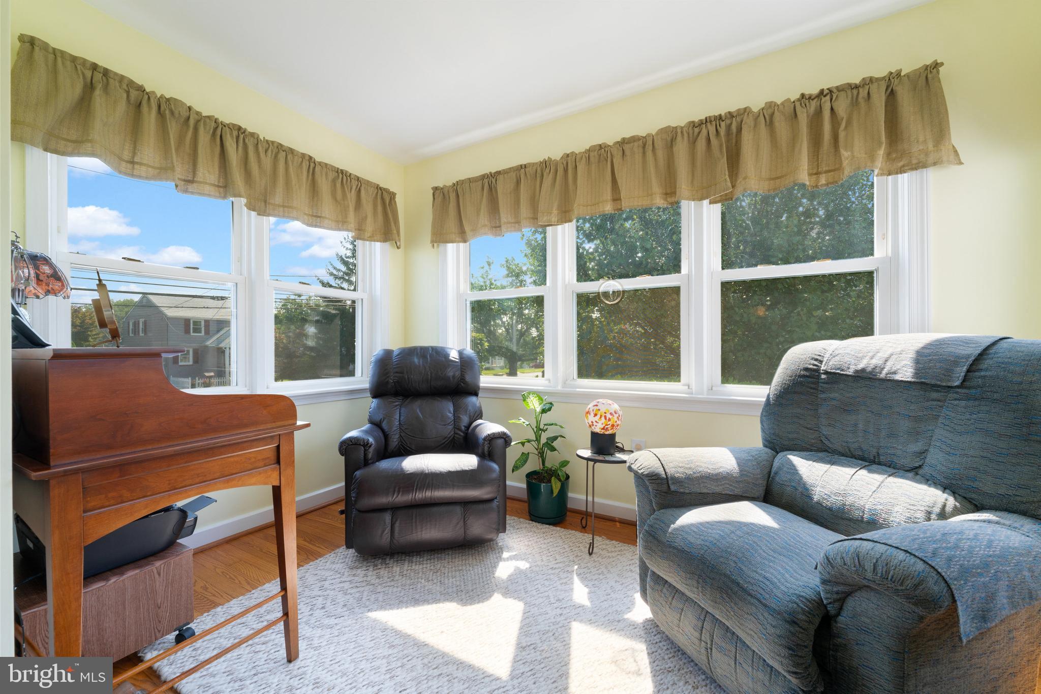 410 Crum Lynne Road Ridley Park, PA 19078 - Photo 14 of 43 a living room with furniture and a large window